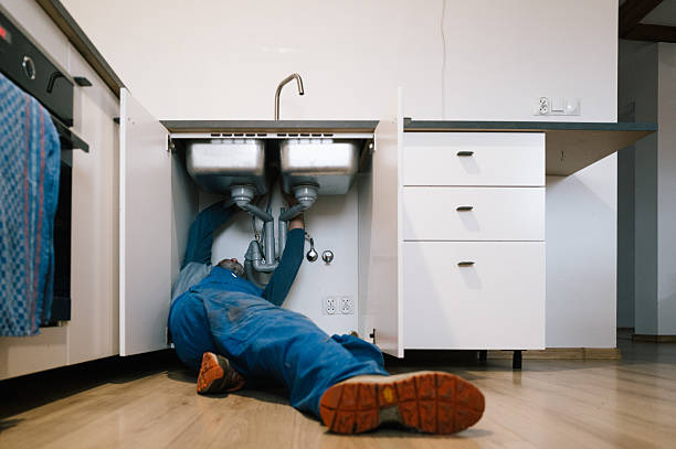 Professional Drain Cleaning technician working in Highland Park, NJ